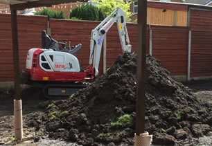 Excavator on building site in Lancashire