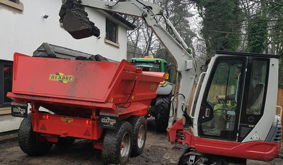 Tractor and trailer with grab wagon