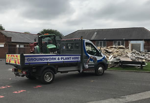 Tractor, trailer and truck at construction site in Lancashire